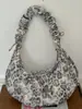 Bolsa de Bolinho Estampa de Leopardo Moda Retrô Outono 2026 Nova Bolsa Leve de Axila Sensação Preguiçosa Relaxada Bolsa de Ombro Único Transversal