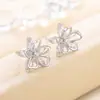 Novos Brincos de Flor de Zircônio Vazados de Camada Dupla Elegantes de Alto Nível com Design de Sentido de Nicho Feminino
