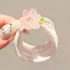 Coloridos coleteros de nuevo estilo 2026, versátiles y dulces, con accesorios de M&M's, anillos de toalla, diseños de dibujos animados y un estilo fresco y lindo, perfectos para accesorios para el cabello de niños