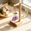 Llavero de flor de lirio del valle hecho a mano con ganchillo transfronterizo Colgante de bolsa de flores de hilo Pequeños accesorios de regalo para niñas