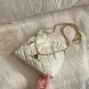 Bolsa de ombro feminina popular deste ano com bordado de losango, cordão e corrente, modelo balde, novidade inverno 2023