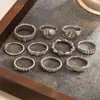 Anillo circular retorcido de metal con incrustaciones de diamantes transfronterizo europeo y americano, anillo para el dedo índice de estilo retro americano, joyería de lujo ligero de alta gama para mujer