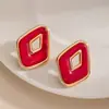 Pendientes geométricos de rombos en color rojo vibrante estilo Hong Kong transfronterizos con ribete dorado, tachuelas huecas de resina de doble capa, accesorios de vestir para mujer