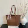 Bolso grande para mujer 2026 nuevo bolso de hombro de moda primavera-verano, bolso tote de nicho de gran capacidad para la escuela y el trabajo