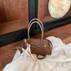 Bolsa pequena quadrada casual estilo coreano para mulheres, nova moda primavera 2026, bolsa de ombro simples para trabalho e deslocamento, bolsa transversal