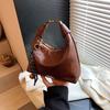 Bolso Retro Tipo Dumpling para Mujer Otoño e Invierno 2026 Nuevo Casual Versátil Cruzado Bolso de Mano Pequeño de Alta Gama Moderno