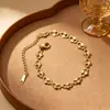 Cadena para Clavícula Empalmada con Patrón Hueco Tallado Acero Inoxidable Oro de 18K Patrón Láser Collar de Temperamento de Lujo Ligero Venta al por Mayor Collar de Alta Calidad
