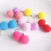Versión coreana de clip para oreja sin dolor para niños clip para oreja para niñas aretes caja de regalo 12 pares de clip para oreja con bola de pelo al por mayor