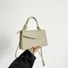 Bolsa de mão pequena para comércio exterior transfronteiriço para mulheres, novo estilo 2026, versátil, moderna e minimalista, bolsa de ombro, bolsa crossbody e pequena bolsa tote quadrada