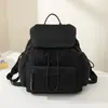 Mochila minimalista popular com cordão para mulheres, nova bolsa escolar versátil para estudantes, grande capacidade, leve para o trajeto e viagens