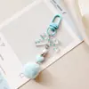 Estilo Ins Estilo Coreano Transparente Puntos de Polka Lazo Lanyard para Teléfono Móvil Llavero de Bola de Pelo Colgante para Bolso de Corazón