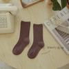Calcetines infantiles Z219 al por mayor solo calcetines de moda otoño color liso niños y niñas color hilado doble aguja algodón calcetines de rizo versátiles