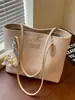Bolso de color liso muy elegante de gran capacidad, nuevo modelo de verano 2026, bolso de hombro retro simple y chic, bolsa de mano para el trabajo