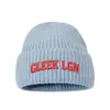 Nuevo gorro de punto bordado estilo coreano para mujer, cálido versátil para otoño e invierno, con bordado de letras, para exteriores, a prueba de frío, protege los oídos, de lana