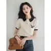 Camiseta Polo Blanca de Manga Corta con Cuello de Polo para Mujer, Nuevo Top de Primavera 2026 de Nicho Único e Impresionante para Verano