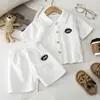 Conjunto de Shorts de Manga Curta de Verão Lapela Letra Duas Peças Bebê Gola POLO Casual Roupa Infantil Certificação de Segurança Classe A