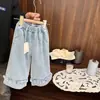 Pantalones de pierna ancha con lunares frescos para bebé niña, Nuevo estilo primavera 2026 para bebés niñas, Jeans elegantes de mezclilla lavada de cintura recta