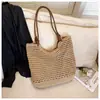 Bolso de mano grande de paja para mujer, nuevo bolso tejido para la playa de vacaciones en la costa primavera 2026, bolso de un solo hombro para debajo del brazo para mujer