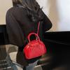 Bolso bandolera de diseño nicho simple estilo occidental para mujer 2025 nuevo lazo portátil hombro boliche bolso almohada