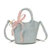 Nova Mini Bolsa de Mão Infantil Menina Estilo Coreano Cor Sólida Laço, Bolsa Cesta Transversal Estilo Pai-Filho