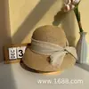 Nuevo sombrero de paja decorado con lazo para mujer, sombrero de sol versátil de ala ancha para salidas de vacaciones de verano en la playa