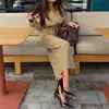 Traje de Saia para Deslocamento Outono 2026 Roupas Femininas Europeias e Americanas Transfronteiriças Dropshipping Moda Slim Fit Casaco Trench Saia com Fenda