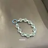 Estilo nuevo y popular transfronterizo Color dopamina hecho a mano con cuentas accesorios de moda de alta gama colgante versátil para teléfono móvil