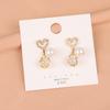 Nuevos pendientes de perlas con incrustaciones de diamantes de imitación, pendientes de plata 925 con aguja, pendientes de amor compactos de temperamento simple japonés y coreano B918