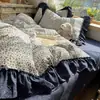 Conjunto de cuatro piezas de algodón y lino estilo francés girly Ins, versión coreana Clase A con encaje y estampados florales, juego de funda de edredón de tres piezas estilo pastoral de algodón puro