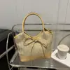 Bolsa de Ombro Feminina Verão 2025 com Laço Sob o Braço Moda Casual Grande Capacidade Bolsa de Mão Nicho Palha Cor Contrastante Bolsa de Ombro