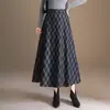 Saia Média Elegante de Lã Mesclada Xadrez Feminina 2026 Outono/Inverno Nova Saia de Cintura Alta que Cobre o Quadril Linha A Saia Elegante Fashionável com Barra Larga
