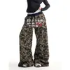 Pantalones de chándal holgados de pierna ancha para mujer, estilo callejero americano de talla grande, camuflaje, dobladillo curvo, novedad Primavera/Verano 2026