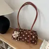 Bolsa de Ombro Feminina Versátil Nova Outono 2026 Transfronteiriça Texturizada de Nicho Simples com Bolinhas para o Dia a Dia