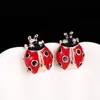 Pendientes de Mariquita de Siete Puntos Versión Coreana Estilo Retro Japonés Personalidad Versátil Divertidos Pendientes para Estudiantes Modelo Nuevo 2024