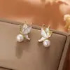 Pendientes de perla flor de alta calidad pasador de plata s925 pendientes Joker elegantes pendientes pequeños exquisitos venta al por mayor