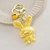 Chaveiro de acrílico de coelho de desenho animado pingente criativo LOVE casal acessórios de chaveiro de mochila pequenos presentes atacado