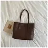 2026 Otoño Temprano Nuevo Bolso de Mano Tote Textura Tejida Gran Capacidad Bolso de Hombro Simple Retro Bolso de Mano Tote para Viajes