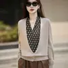 Cárdigan de punto fino con cuello en V para mujer, nuevo para Otoño/Invierno 2026, manga larga, diseño de lunares, top tipo dos piezas de imitación