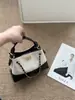 Bolso tote de diseño exclusivo estilo retro Chanel, nuevo bolso de hombro acolchado versátil 2026, bolso de mano de cadena a la moda