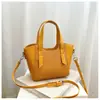 Bolso de mano de alta gama, elegante, de nicho para mujer, nuevo y moderno, bolso tipo cubo vintage para el día a día, bolso versátil de hombro y cruzado