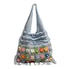 Nueva bolsa tejida a mano de ganchillo transfronteriza, bolso de mano de diseño nicho con cuadrados de la abuela, bolso de hombro para vacaciones para mujer