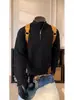 Suéter de punto para hombre con media cremallera y diseño de patchwork, una pieza básica versátil para capas en otoño e invierno, que ofrece un estilo relajado y casual