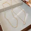 Collar de Perlas con Colgante Plisado Estilo Francés, Lujo Ligero y Sensación de Alta Gama, Cadena para Clavícula para Mujer, Accesorio de Cuello de Moda y Elegante con Diseño Único
