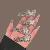 Pinza para el pelo de flecos de alta gama estilo Ins, pinza de pico de pato, moderna y simple, elegante diseño de mariposa y flor, pinza lateral de aleación de plata