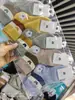 Calcetines de algodón para niños Otoño e Invierno, calcetines de moda de media pantorrilla, calcetines frescos, lindos, de moda universitaria, en stock, venta al por mayor de fábrica