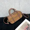 Bolsa de Bolos Portátil Retro para Mujer 2026 Nuevo Estilo Bolso Cruzado Simple y de Moda para el Trabajo y los Viajes al Trabajo Bolso de Hombro