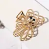 Clip de metal hueco de oso Corea del Sur clip femenino irregular simple para la parte trasera de la cabeza clip de tiburón en línea clip grande de verano para el pelo