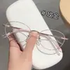 Nuevos y Modernos Marcos de Gafas Ovalados de Titanio Ultra Ligeros de Gama Alta para Mujer Danyang al por Mayor, Adecuados para Lentes de Graduación