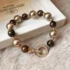 Pulseira Olho de Tigre Maillard Pérola Marrom Mocha Temperamento Cristal Pérola Nicho Luxo Leve Retro High-End