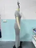 Primavera/Verano 2026 Nuevo Estilo Europeo y Americano Pantalones Acampanados Transfronterizos Crop Top de Cintura Alta Manga Corta Ropa Deportiva Multiusos Traje Casual para Mujer